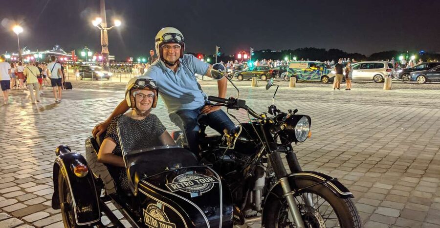 Bordeaux: Nighttime Sidecar Tour with Wine Tasting - Pickup and the first illuminated stops: Place de la Bourse and the St. Michael area