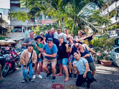 Discover Saigon's Local Sites and Culture by Motorbike - Safety and comfort: helmets, ponchos, and the traffic reality