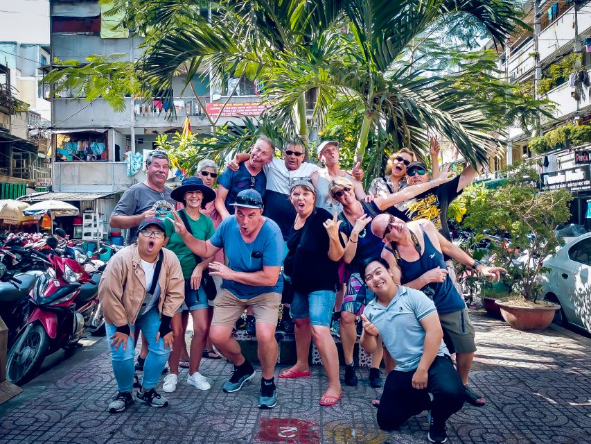 Discover Saigon's Local Sites and Culture by Motorbike - Safety and comfort: helmets, ponchos, and the traffic reality